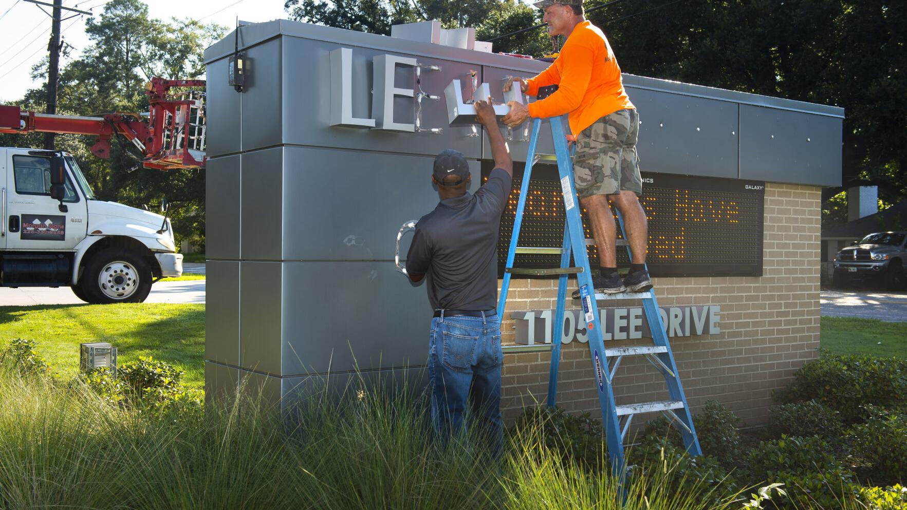 Photos, video: Watch the Lee High sign come down, at newly-named Liberty High in Baton Rouge